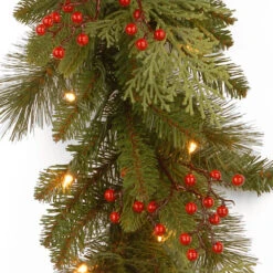 Christmas Central 9' X 12" Pre-Lit Cedar Leaves And Berries Artificial Christmas Garland, Clear Lights -Northlight dnat pecc3 300 9b 1 3 38334.1631811749