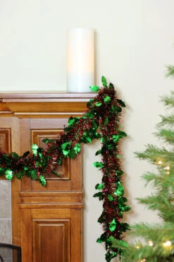Northlight 50' Shiny Red Christmas Tinsel Garland With Green Holly - Unlit -Northlight mfzole80q8wl4xcqtxaymz6r3fr7mwmq 04337.1588344869